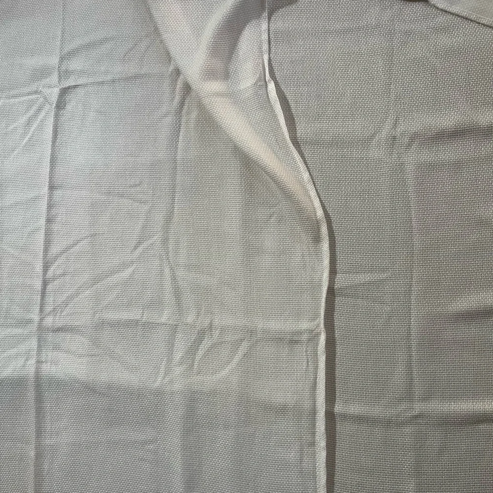 2 Panels Of White Textured Fabric Curtains Each are 63x36